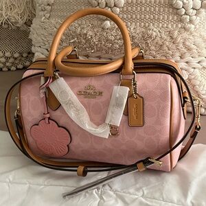 Coach Pink Satchel with Tan Trim and Floral Charm